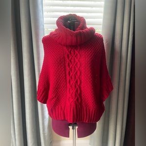 Gently used. Size Small/Med Gently used.Red Cowl Neck knitted sweater poncho.